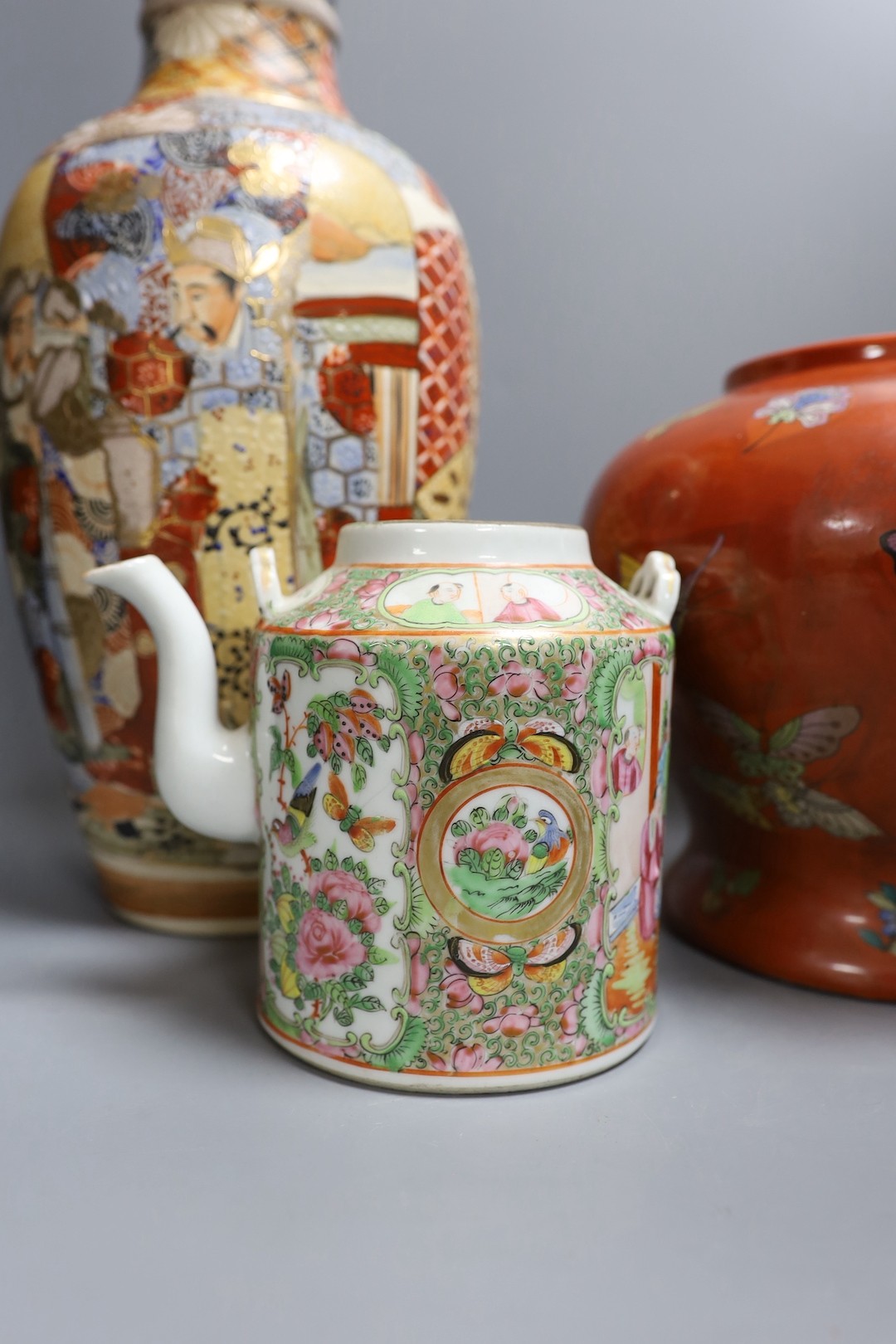 Japanese satsuma vase, 39cm high, together with a red Chinese vase and 19th century Chinese famille rose teapot